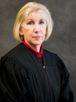 Photo of White Female Judge with gray background